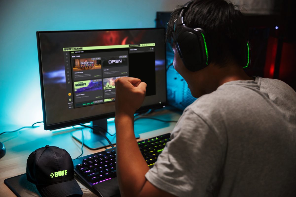 Buff At Computer How Gamers Earn Rewards Just by Playing in 2025